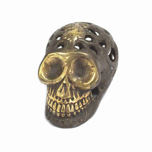 Small Vintage Brass Skull Figurine on a white background, front in a different angle.