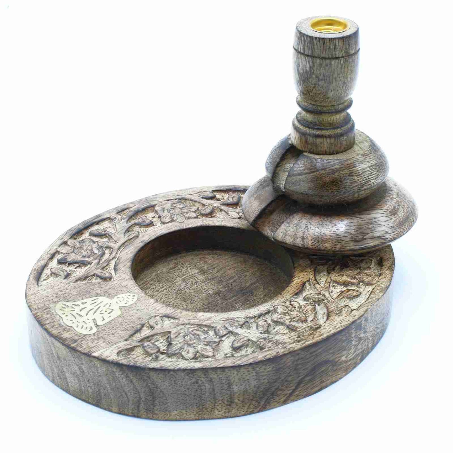 Wooden incense backflow burner with intricate carvings on a white background