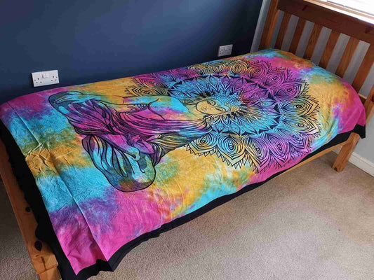 Single Cotton Bedspread / Wall Hanging - Peaceful Buddha on a bed in a room.