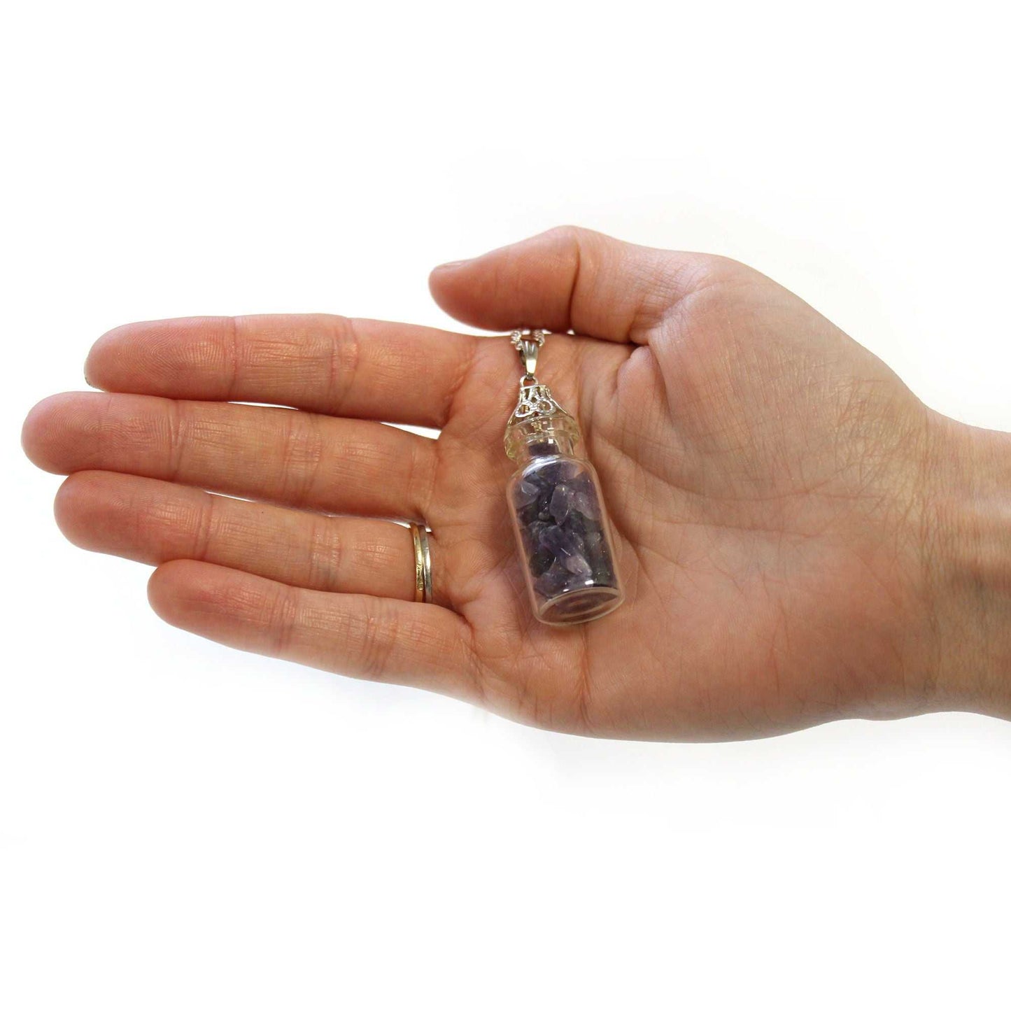 Hand holding Bottled Gemstones Necklace - Amethyst
