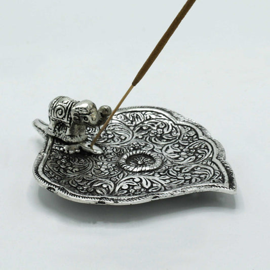Polished Aluminium Elephant Leaf Incense Holder with a single incense stick