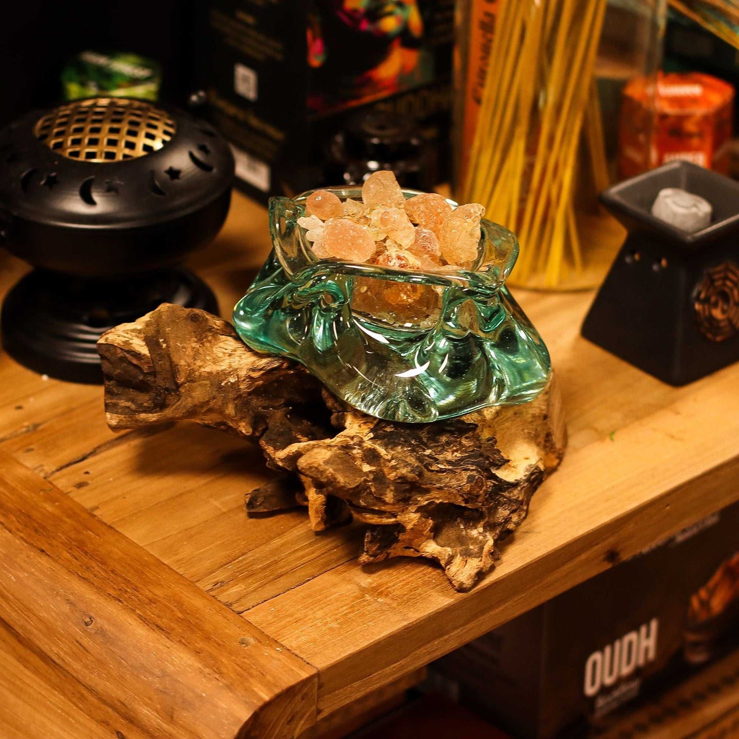 Molten Glass Chunky Ashtray / Candle Holder on Wood 23cm containg rock slats set on a desk