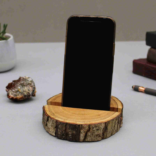 Phone on a wooden stand with a natural wood texture
