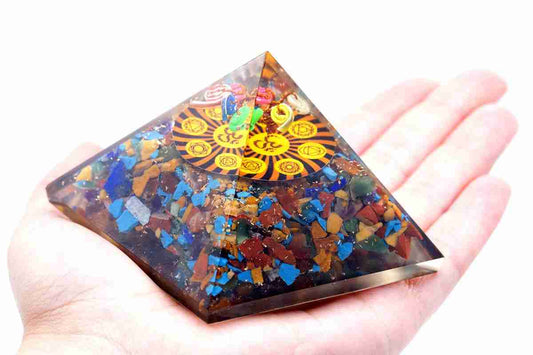 Orgonite Pyramid - Om Chakra held in the hand