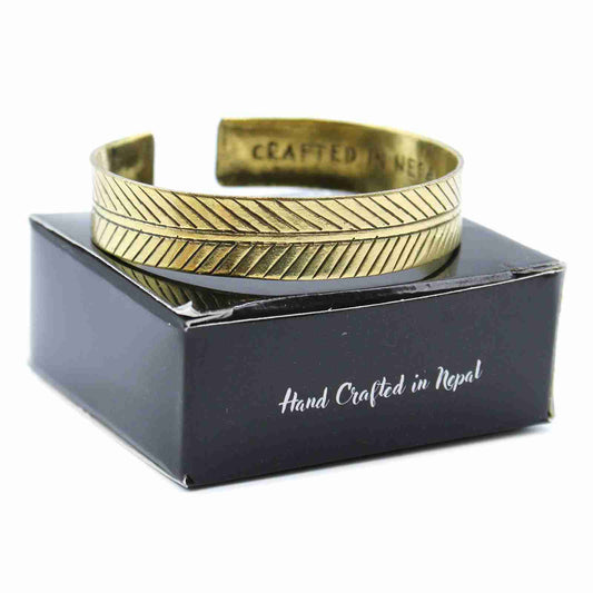 Brass Tibetan Mantra Bracelet - Tree of Lifet on a black box with 'Hand Crafted in Nepal' text