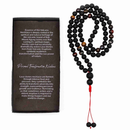Meditation necklace with black beads and red accent next to a description card on a white background