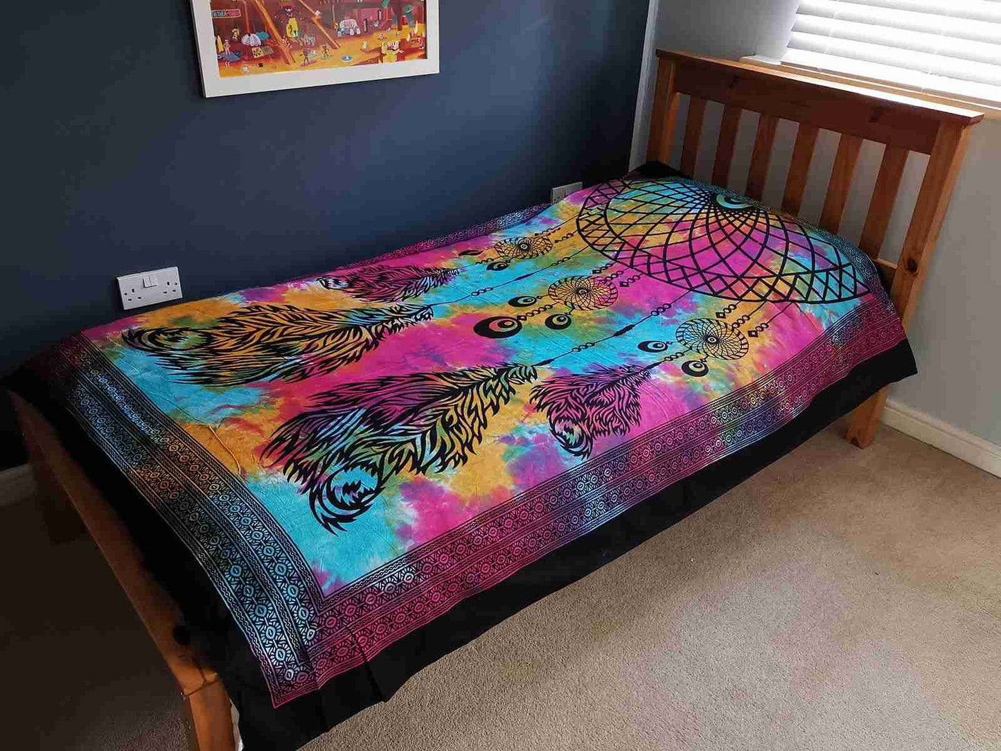 Single Cotton Bedspread / Wall Hanging - Dreamcatcher on a bed in a room.
