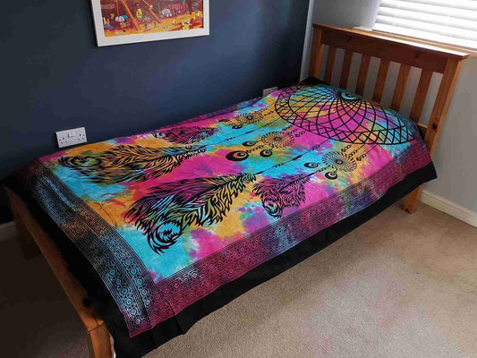 Single Cotton Bedspread / Wall Hanging - Dreamcatcher on a bed in a room.