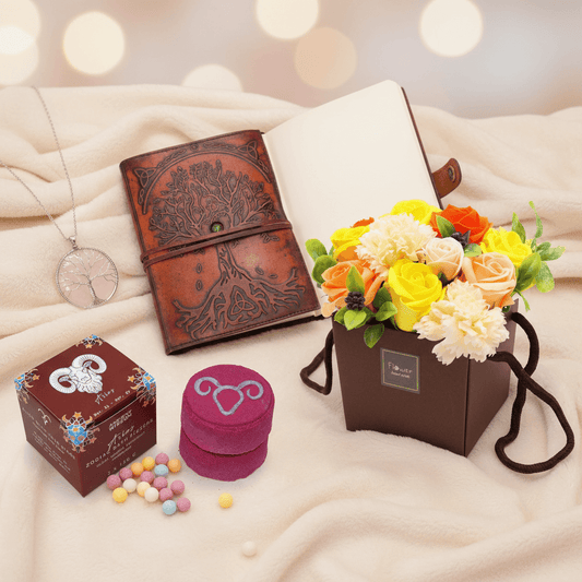 various gift ideas set out on a soft cream throw