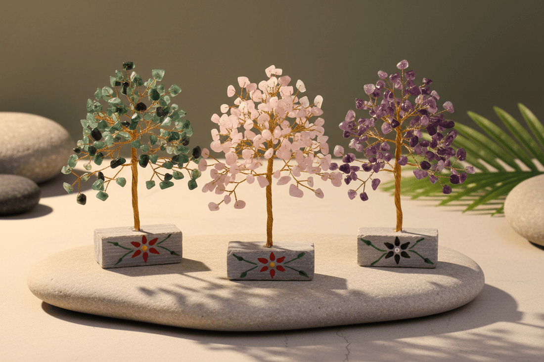 Handcrafted Indian Gemstone Trees featuring moss agate, rose quartz, and amethyst crystals on natural stone bases - artisan crystal décor from India