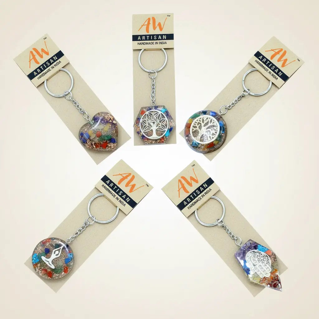 5 Orgonite keyrings on a cream background