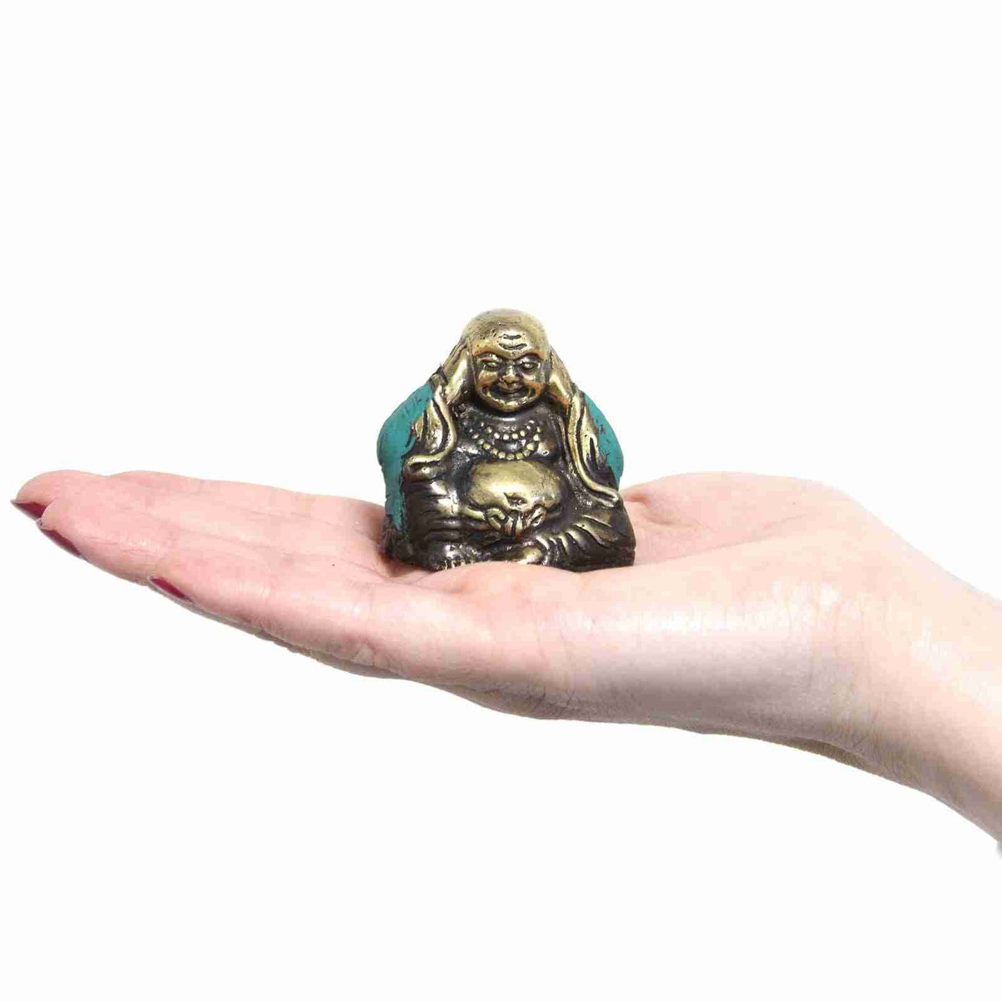 Brass Buddha Figurine Set of 3 See No Evil held in a hand against a white background.
