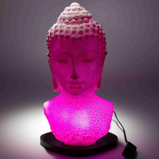 Cherry Crackle Buddha Bust Lamp on a dark background