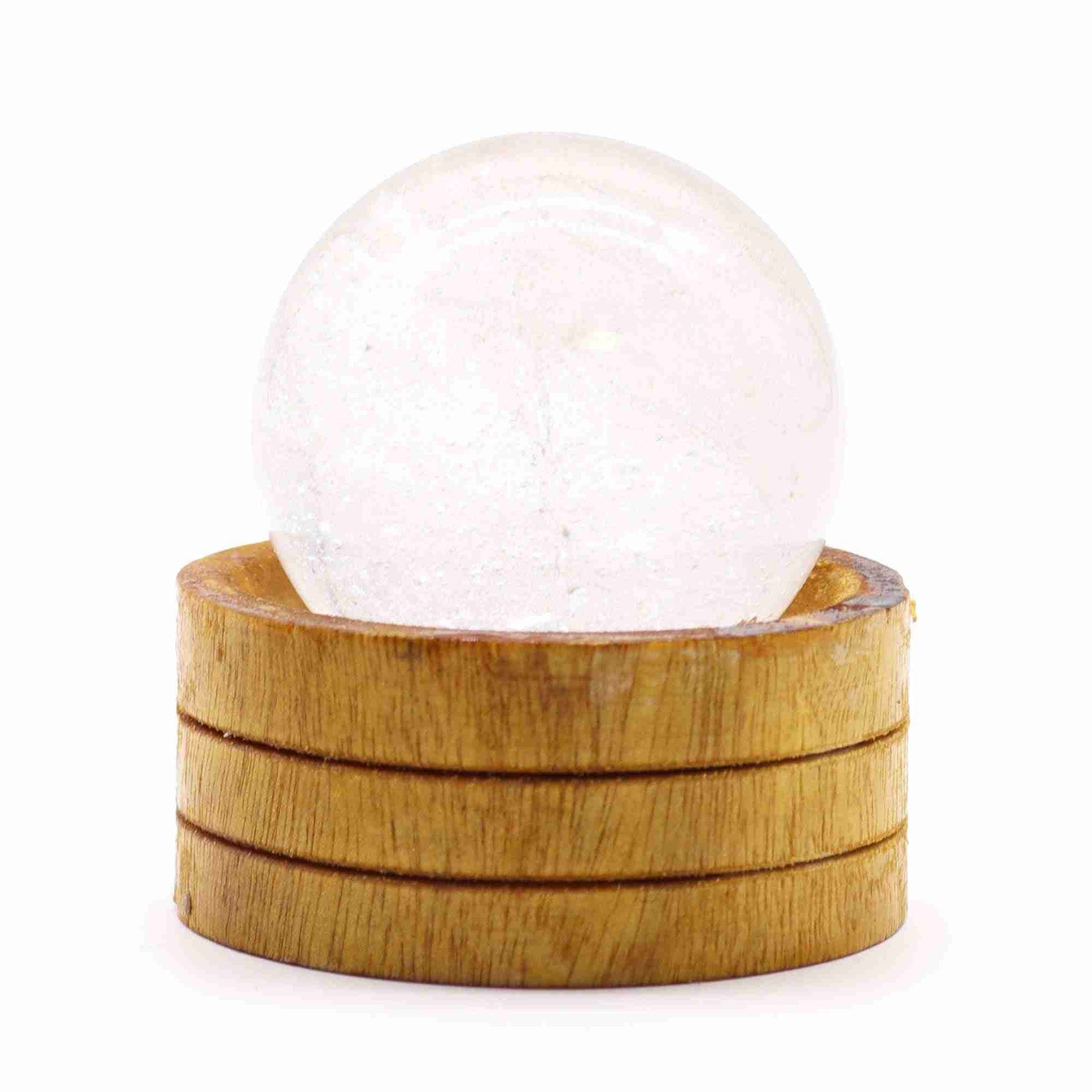 Gemstone Sphere 50mm - Clear Quartz with Stand on a white background