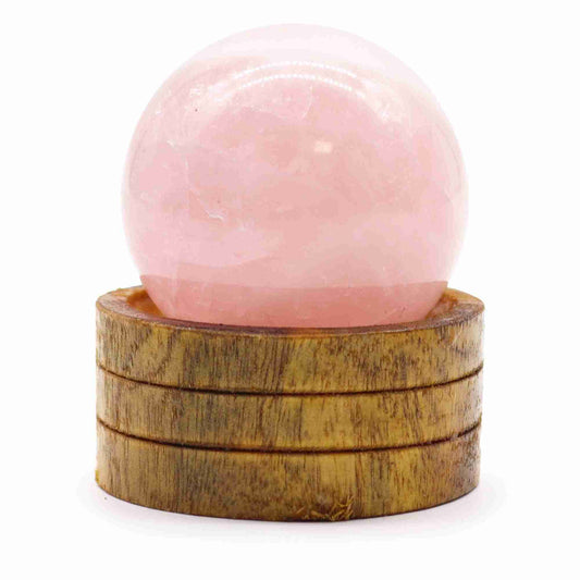 Gemstone Sphere 50mm - Rose Quartz with Stand against a white background