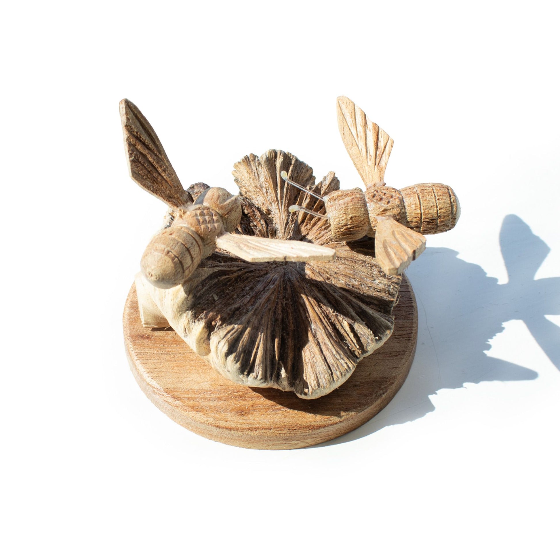 Handmade Parasite Wood Art Carving - Bees in The Works on a white background