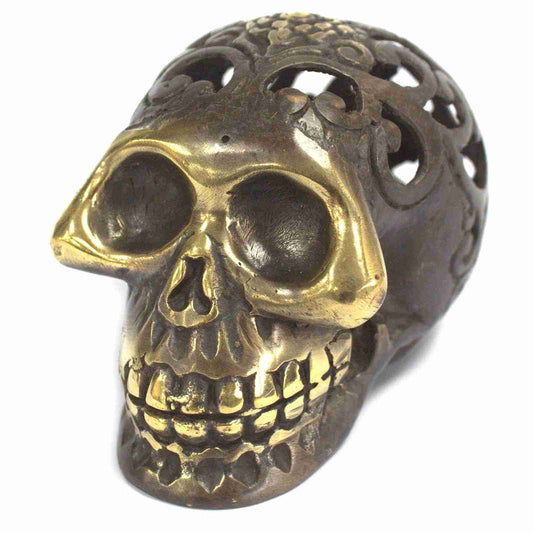 Large Vintage Brass Skull Figurine on a white background, front view.