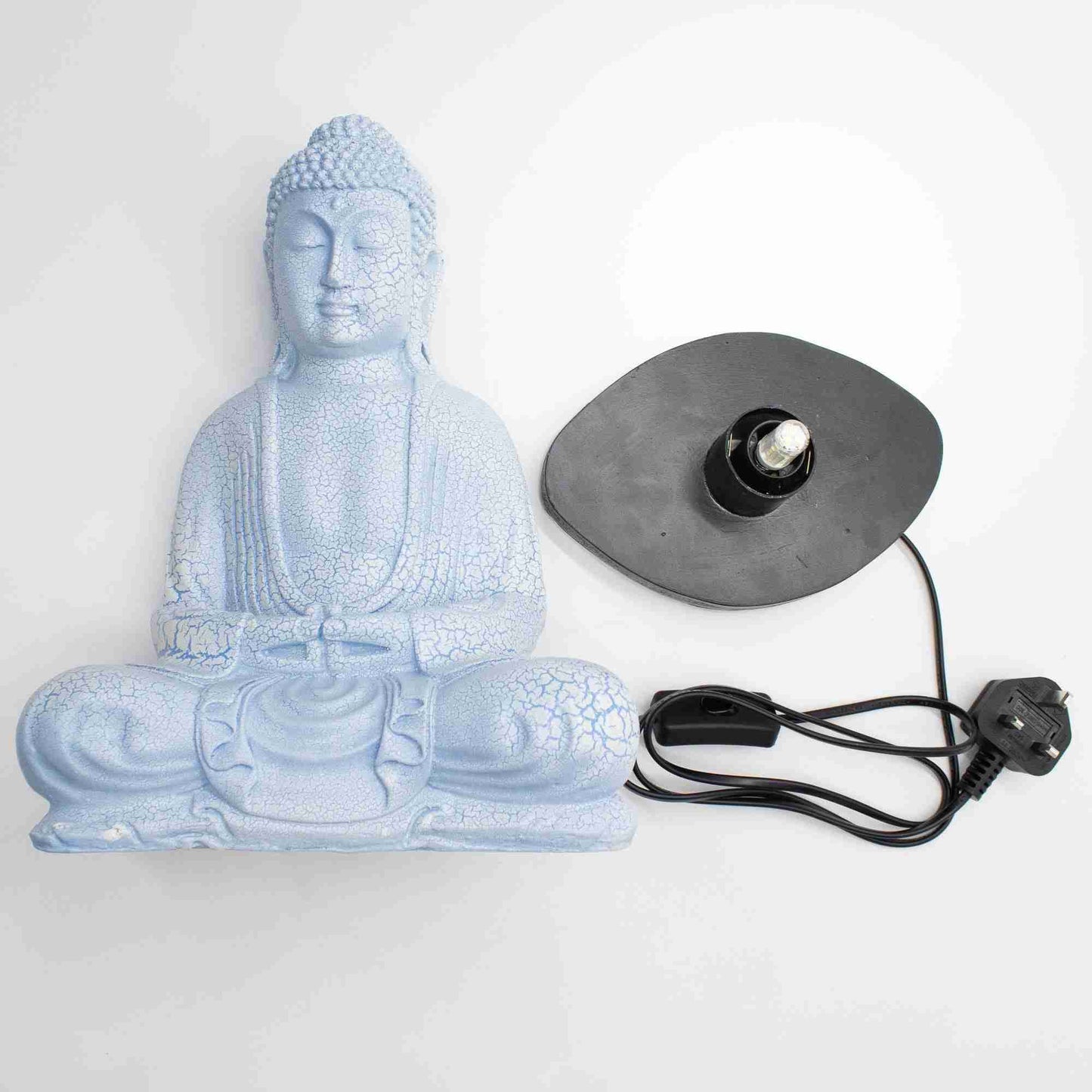 Meditation Buddha Lamp, Sky Blue with a black lamp base and power cord on a white background.
