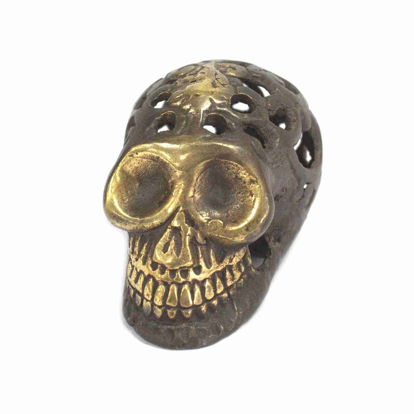 Small Vintage Brass Skull Figurine on a white background, front in a different angle.