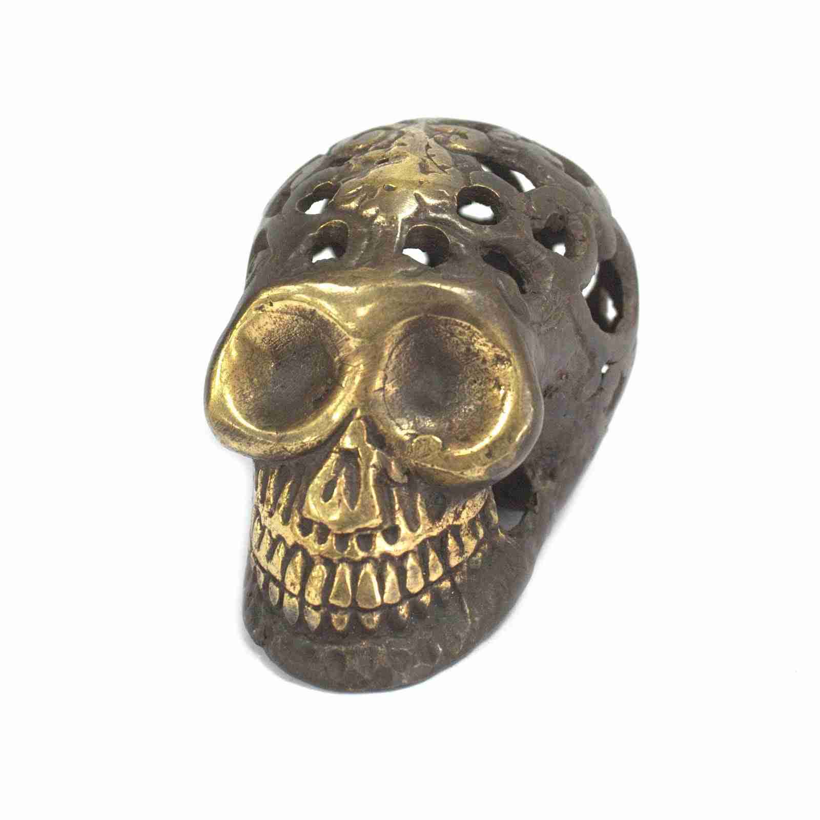 Small Vintage Brass Skull Figurine on a white background, front in a different angle.