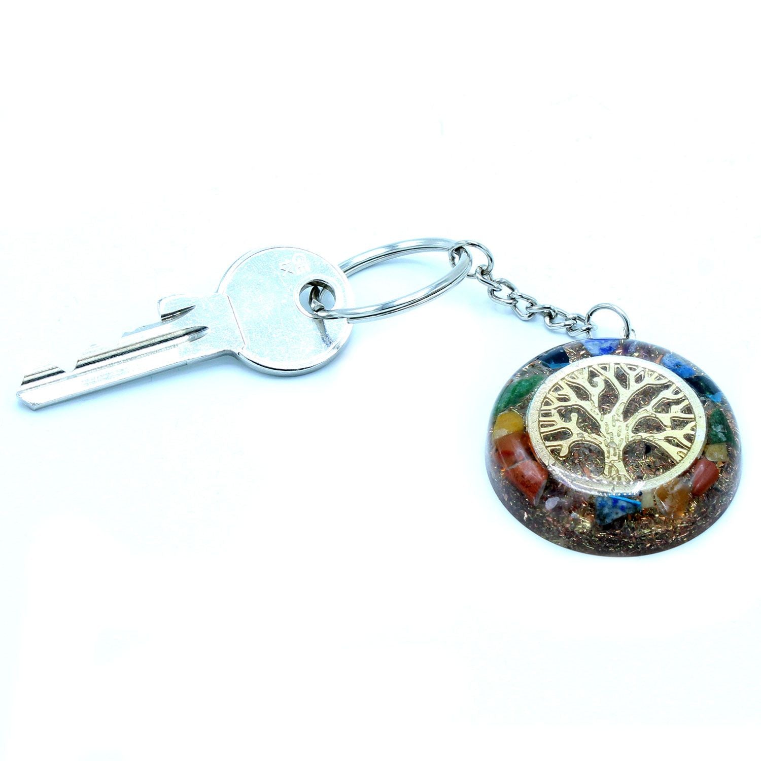 Orgonite Power Keyring - Gemstones Chakra Tree of Life connected to a key on a white background
