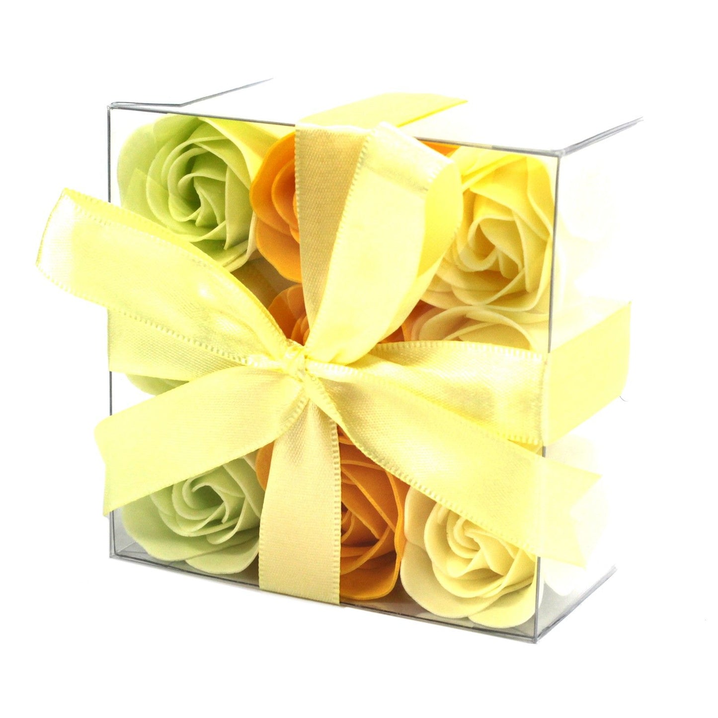 Box of spring colour soap roses with a yellow bow in clear gift box