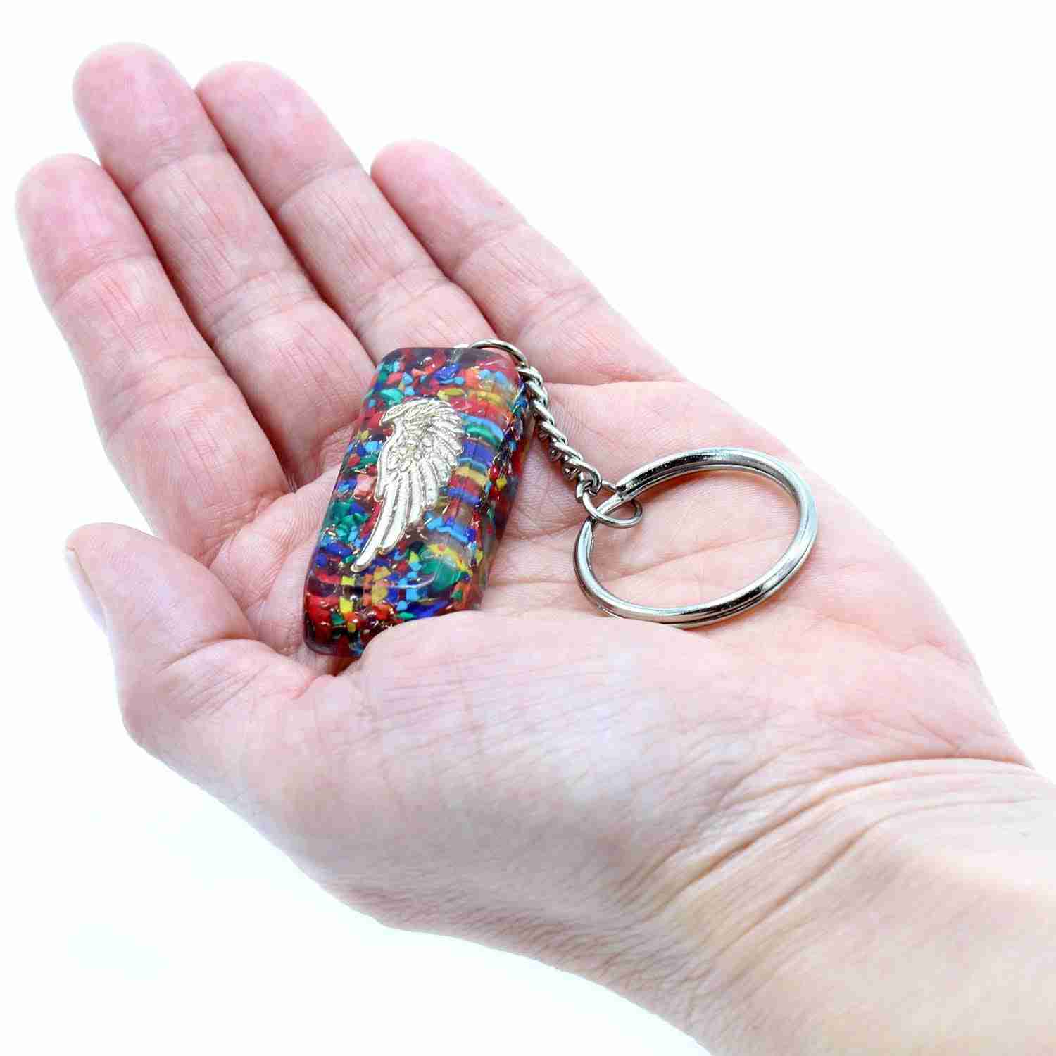 Orgonite Power Keyring - Guardian Protection held in a hand against a white background
