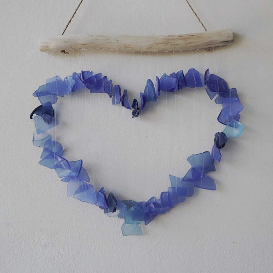 Recycled Glass Wind Chime - Blue shaped like a heart on a white background