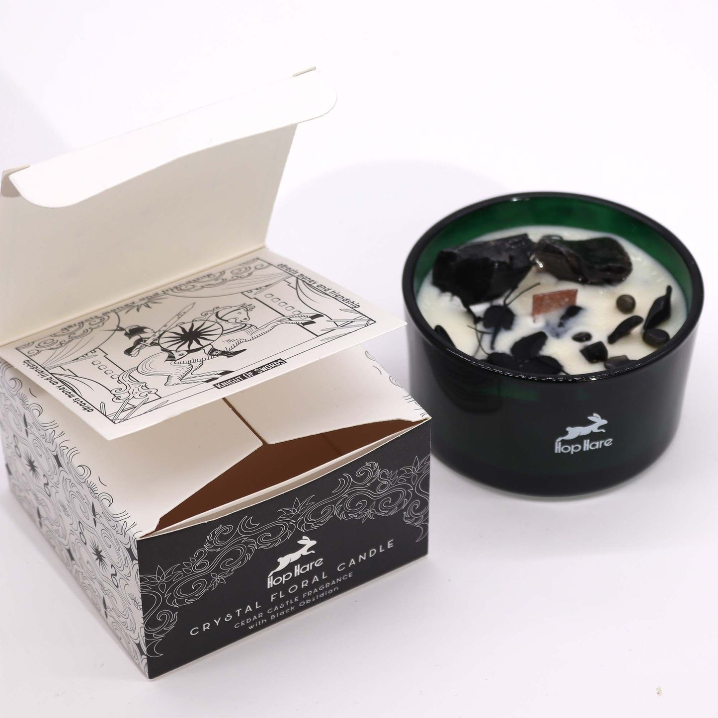 Hop Hare Crystal Magic Flower Candle - The Knight of Swords with a decorative box on a white background