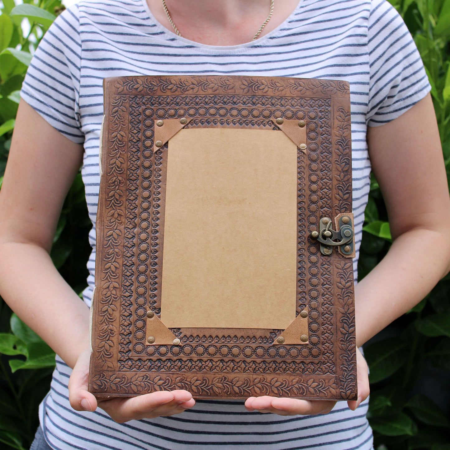 Huge Customisable Visitor Leather Book held by a person to show size
