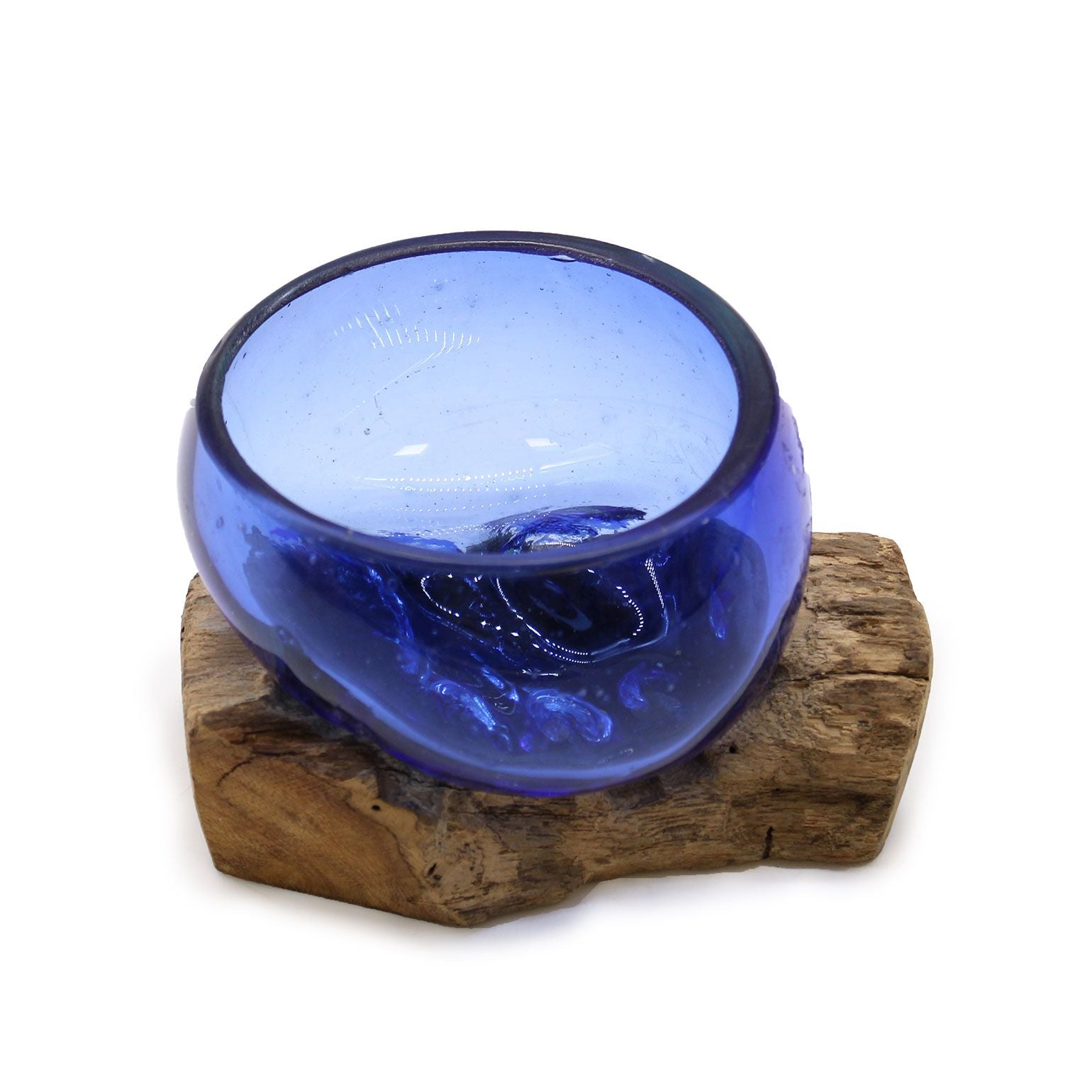 Blue molten glass bowl on a wooden base with a white background