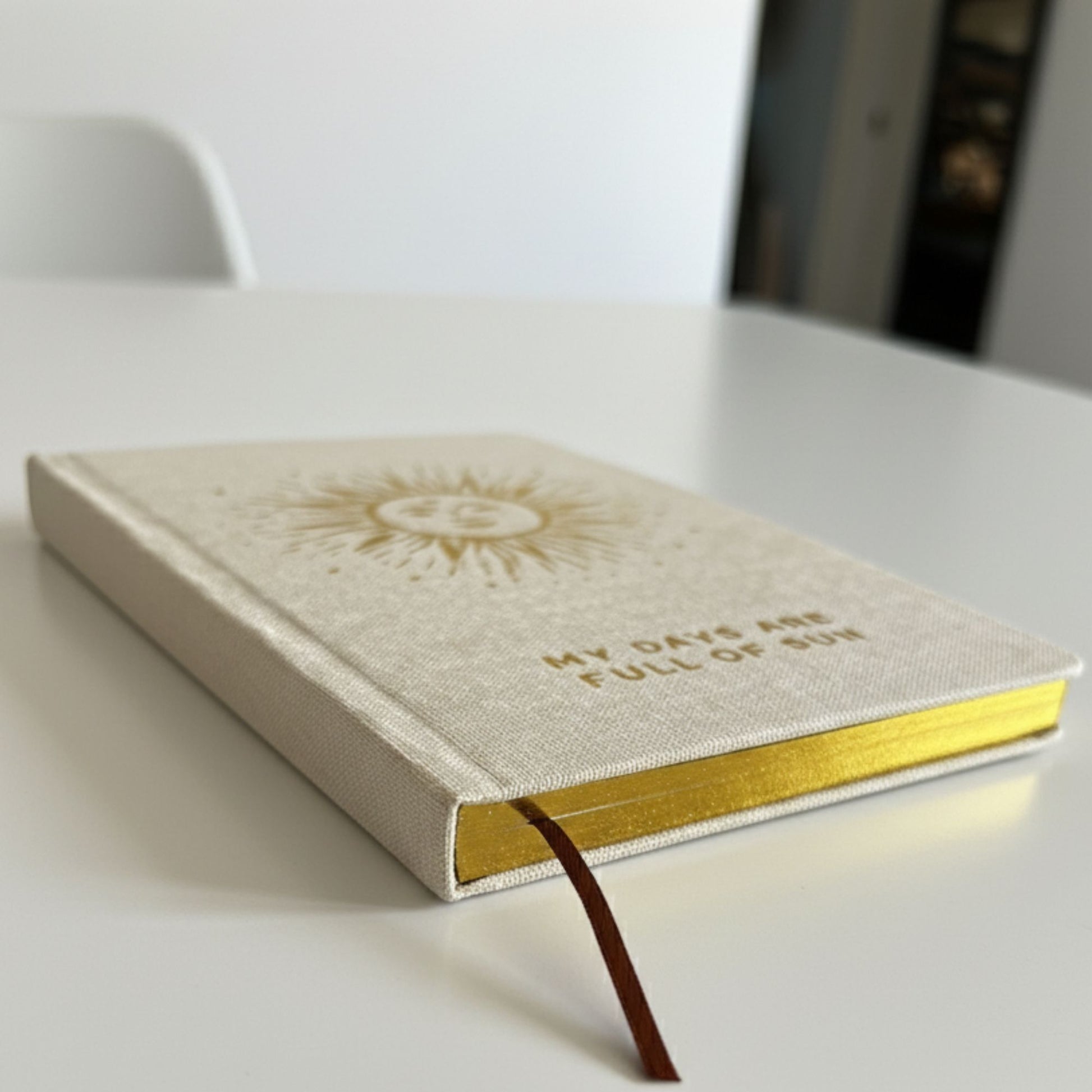 Ivory Gratitude Journal with Gold Lining - 120 pages - My Days are Full of Sun (side view showing gold lining of pages)