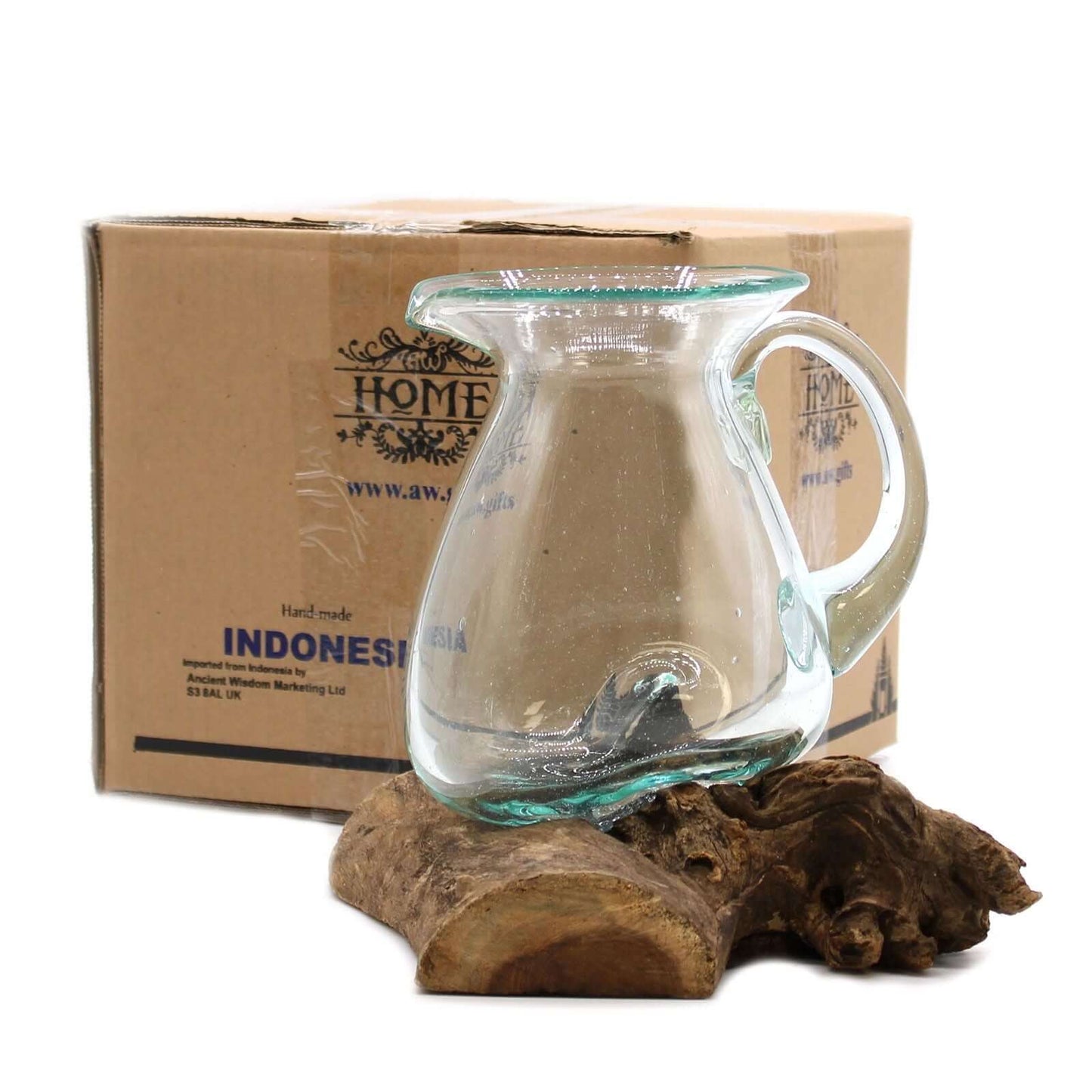 Molten Glass on Wood- Water Jug handcrafted from recycled glass displayed on a natural wood base.