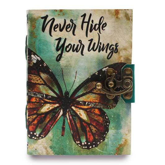 Notebook with butterfly design and 'Never Hide Your Wings' text on a textured background