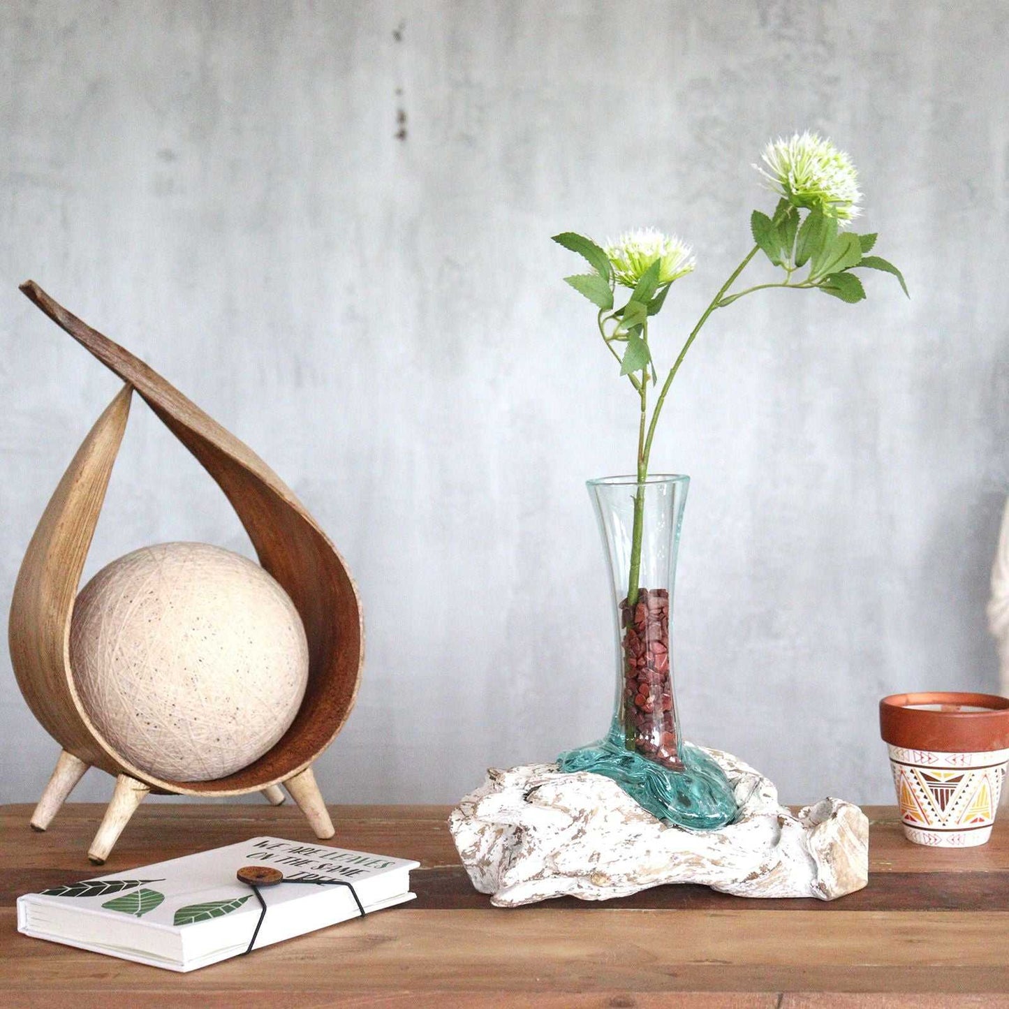 Molten Glass on Whitewash Wood - Vase - Small with crystals and a flower with a coconut leaf lamp on a desk