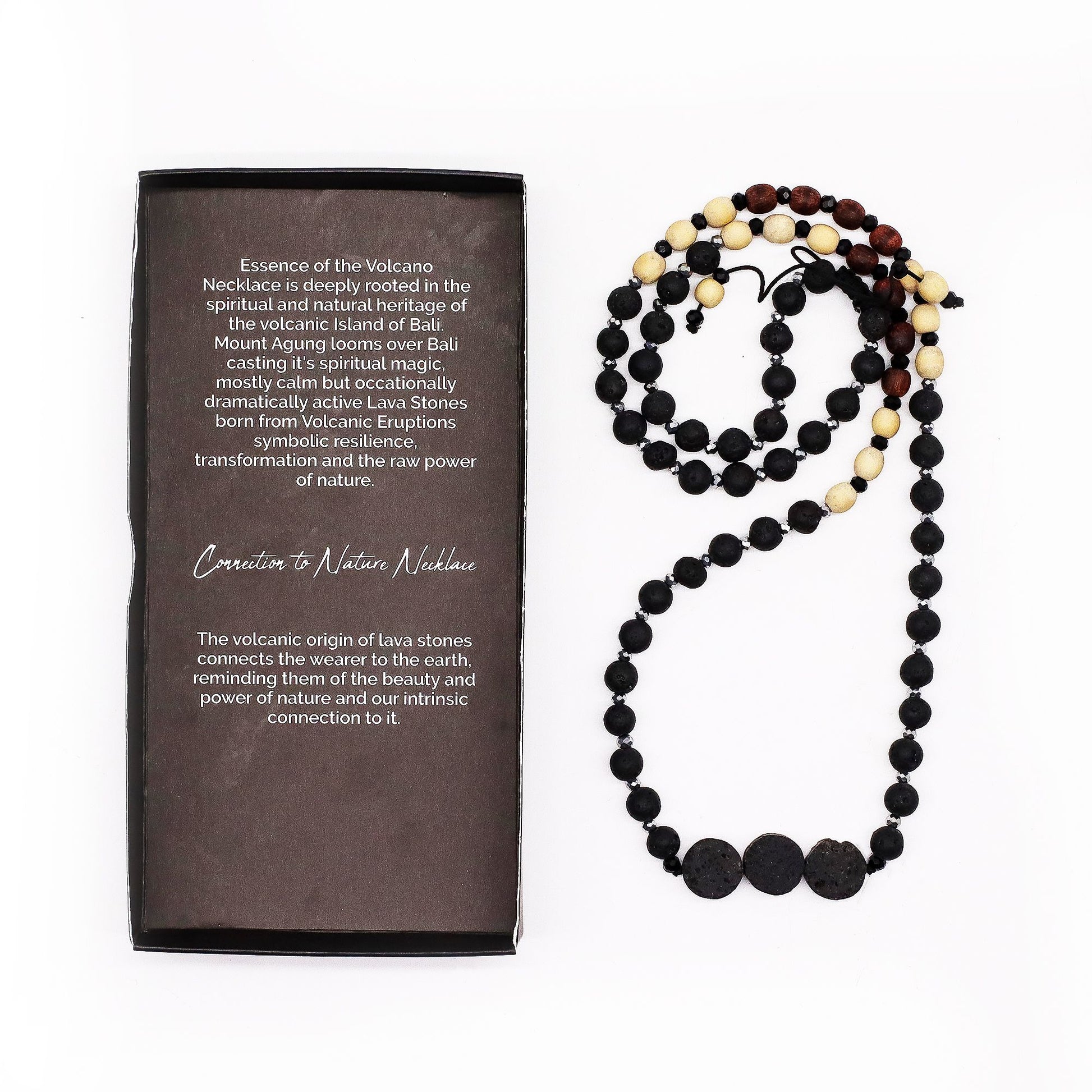 Essence of the Volcano Necklace with a descriptive card on a white background