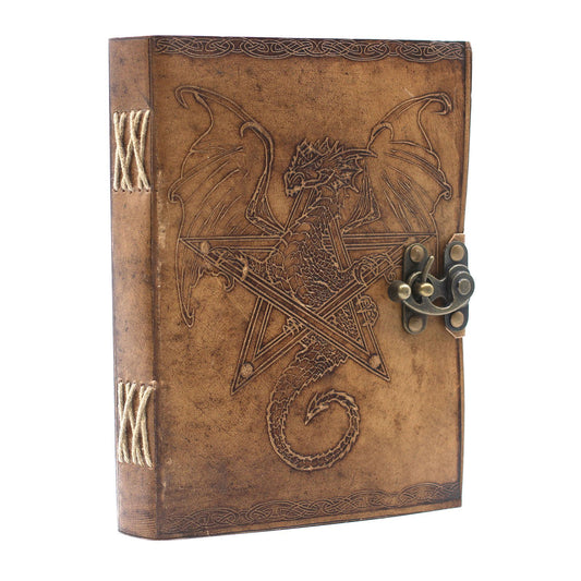 Decorative leather-bound notebook with dragon design and latch on a white background
