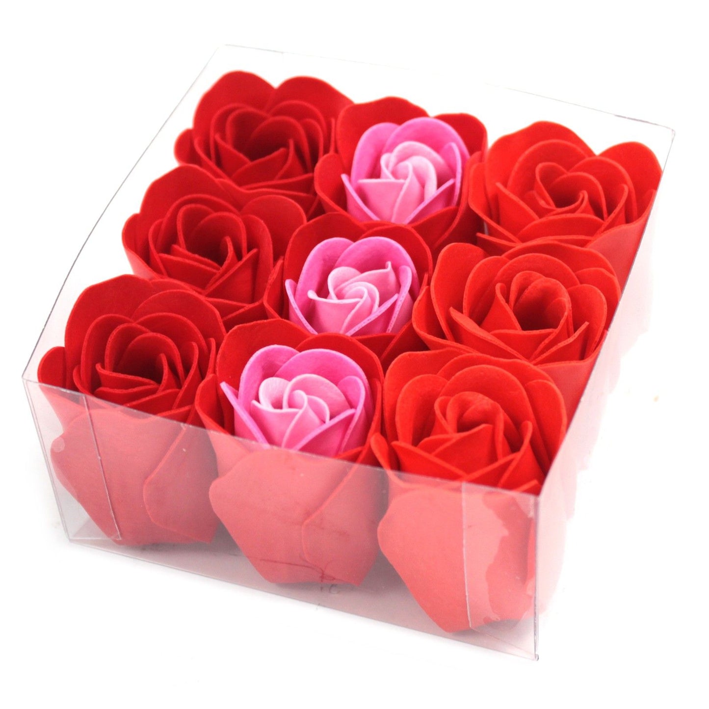 Red soap roses in a clear gift box with a red bow top view