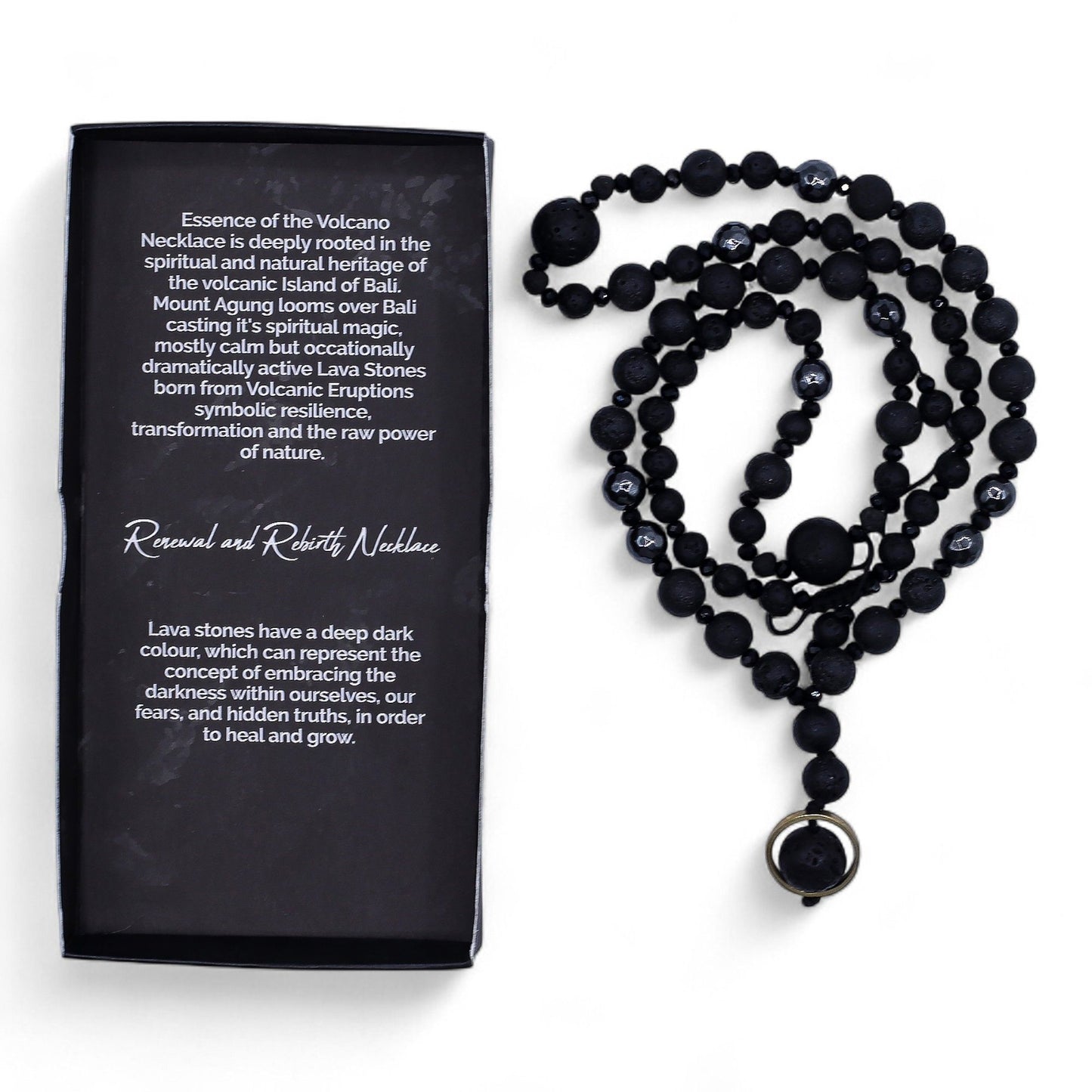 Black beaded necklace with a pendant next to a black box with text on a white background