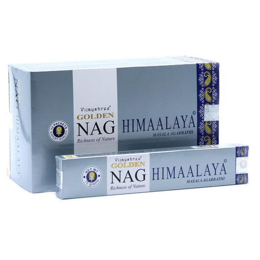 Two boxes of Golden Nag Himalaya incense on a white background