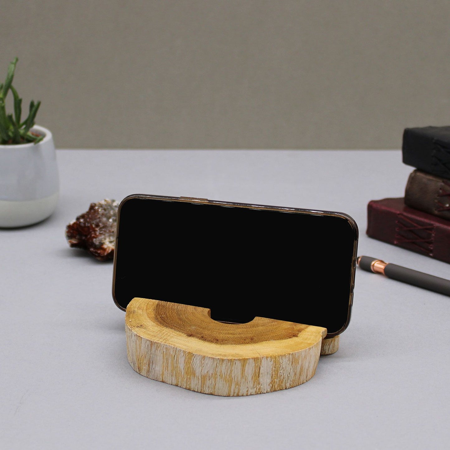 Large Gamal Wood Phone Holder - Whitewash holding phone in a lying down position