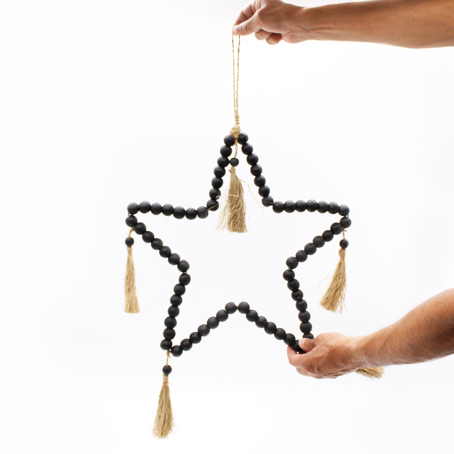 Large Bead Star Mobile held by two hands