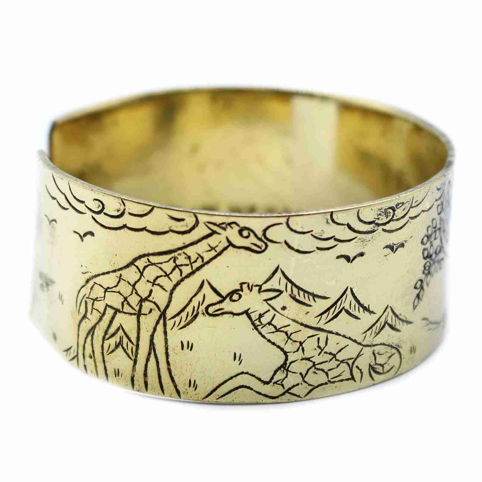 Brass Tibetan Mantra Bracelet - Tree of Life with engraved design of giraffes and mountains on a white background