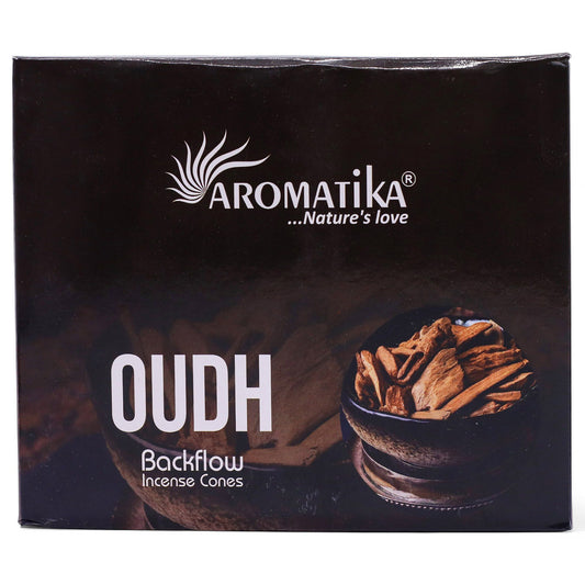 Aromatika Oudh Backflow Incense Cones packaging with incense cones and a bowl on a dark background.