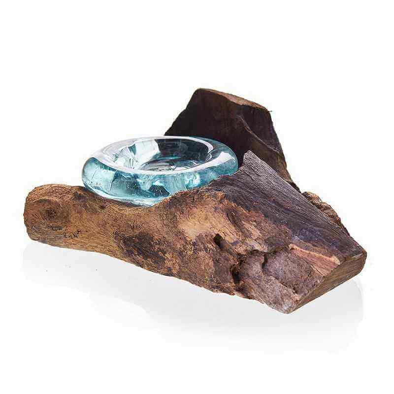 Teal candle in a wooden holder on a white background