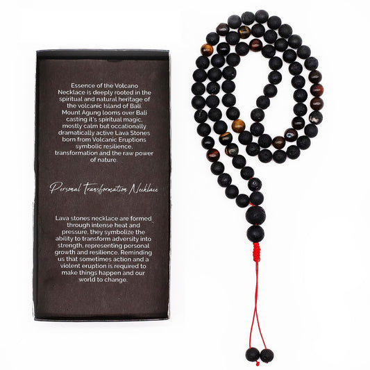 Meditation necklace with black beads and red accent next to a description card on a white background
