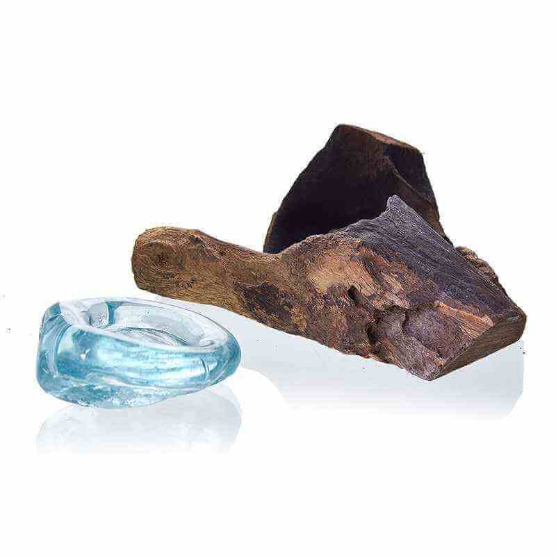 Blue crystal and wooden piece on a white background
