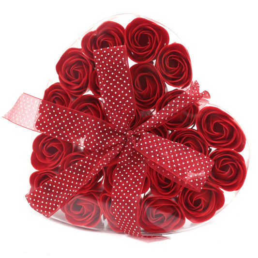 Heart bouquet of red soap roses with a polka dot ribbon wrapped aound clear gift box