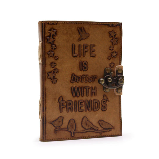 Brown leather journal with 'Life is better with friends' engraving on a white background