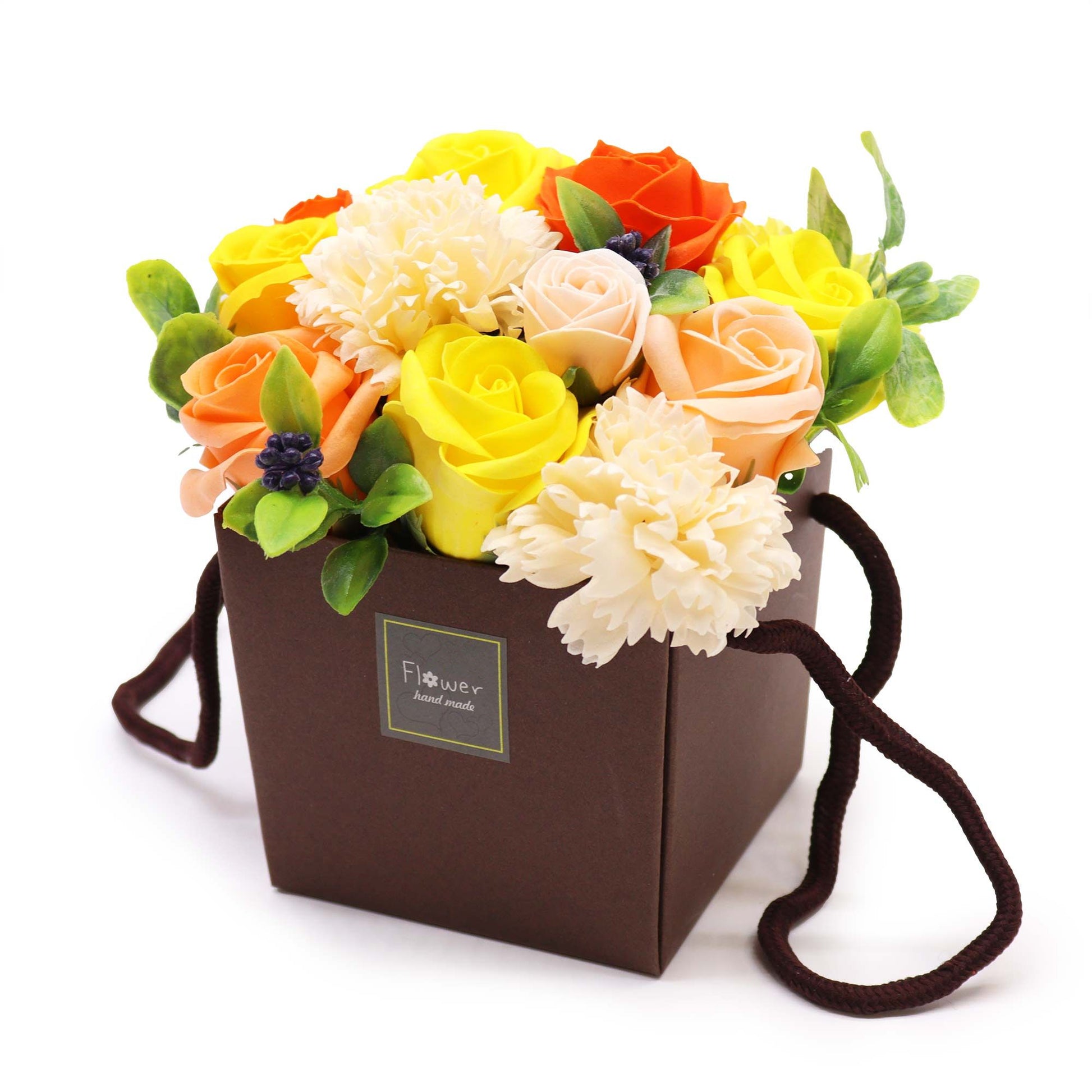 Floral soap flower arrangement in a brown gift box